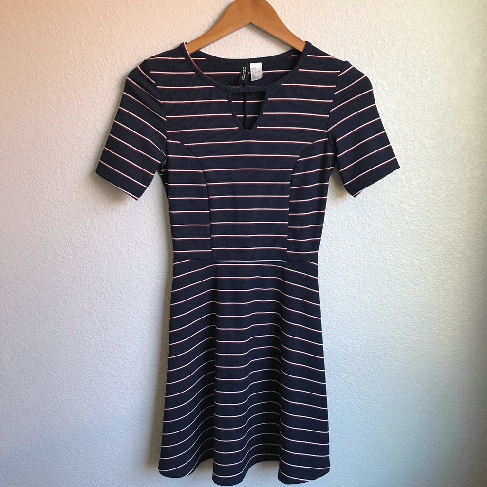 Divided navy dress with red and white stripes